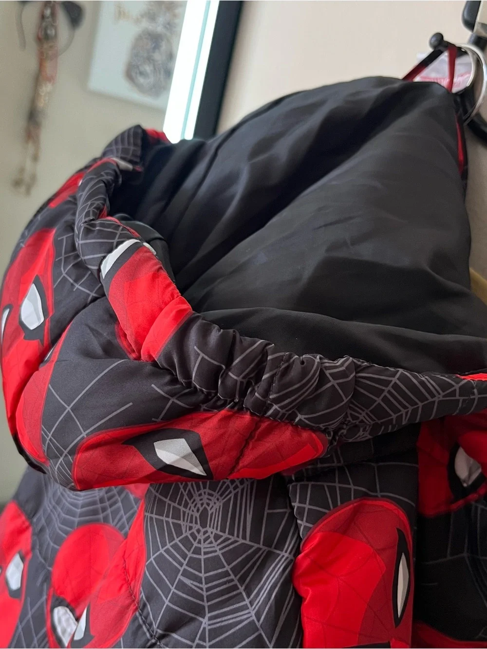 Marvel Black Puffer Jacket with Red Spider-Man Face Print